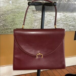 Cartier
Bordeaux Leather Handbag/ Kelly Bag